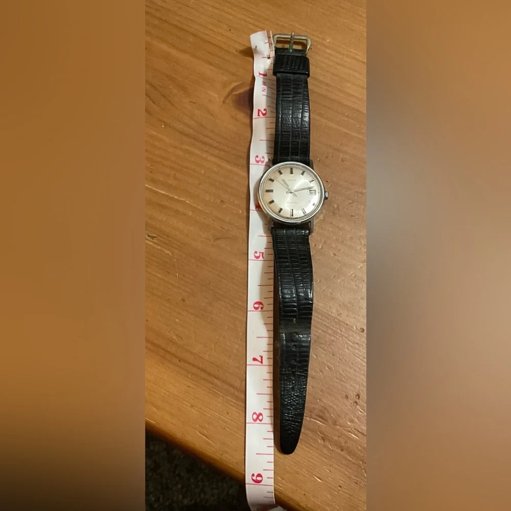 Timex: Men’s vintage (rare find) electromechanical wrist watch black wrist band.